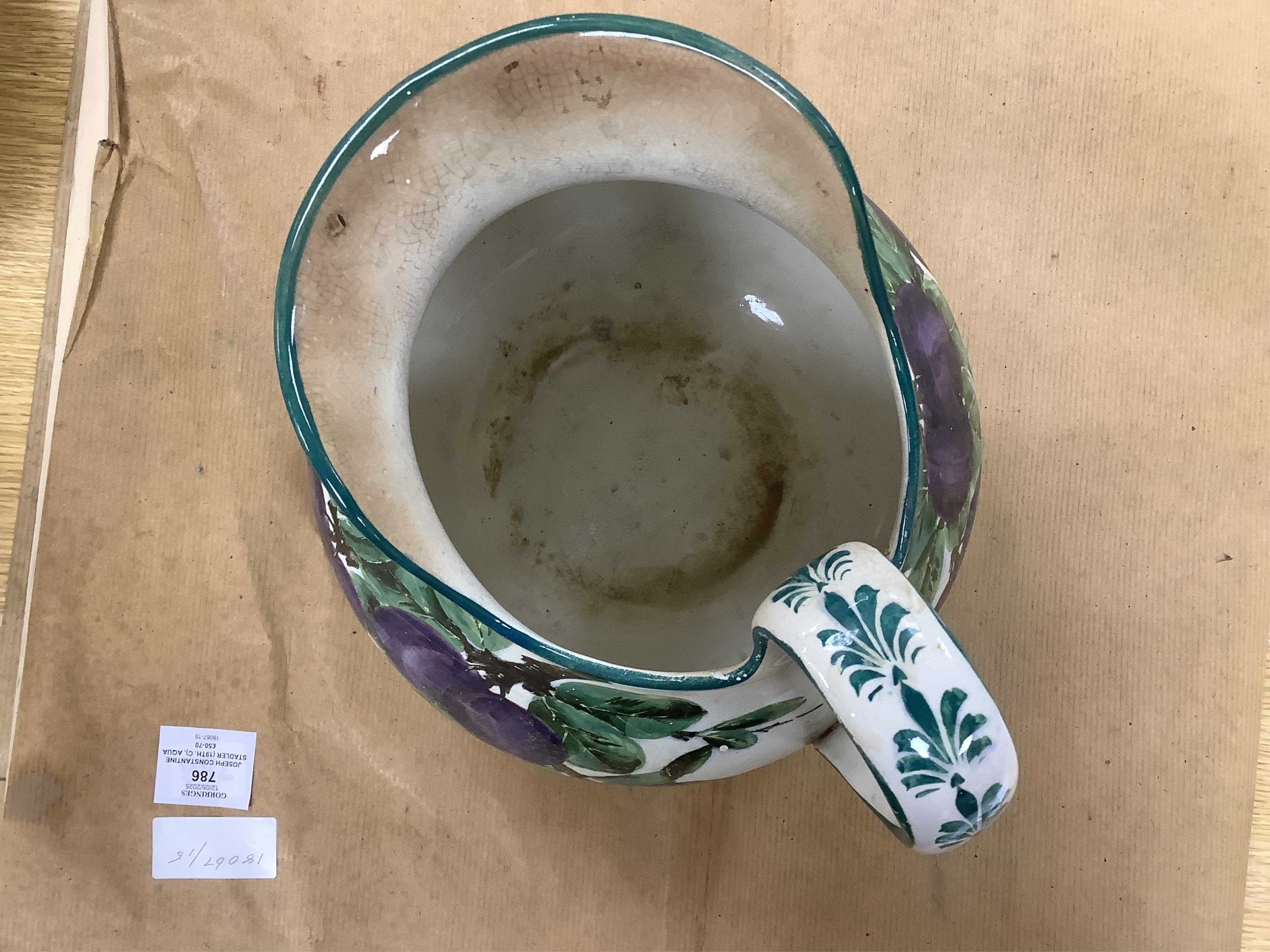A Wemyss four-piece toilet set, a jug and basin, soap dish with liner, and bowl, damson pattern. Basin 39cm diameter., Condition - poor